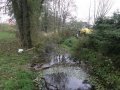 Trusovický potok, pohled z lávky (od č. p. 122)