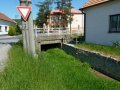 Mostek přes Havřický potok mezi zatrubněním koryta