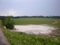 Přívalové deště v červenci 2009 - vodní laguna nad silnicí od Nových Dvorů k Suchdolu