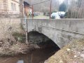 Vodočetná lať na Heřmánkovickém potoce u č.p. 122