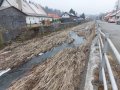 Opevněné koryto Libavského potoka v ulici Jaselská